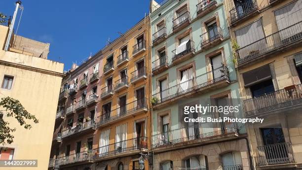 traditional residential buildings in the el born area in the old city center of barcelona, spain - spain fotografías e imágenes de stock
