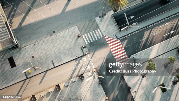 view from above of moern road intersection with road markings - 斜めから見た図 ストックフォトと画像