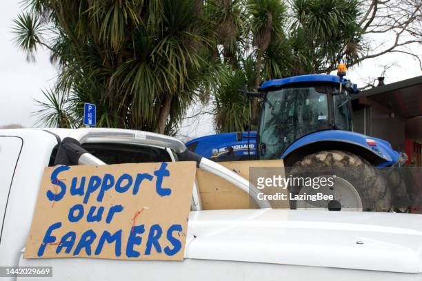 support our farmers billboard attached to ute in carpark in the tasman district, new zealand - new zealand farmers stock pictures, royalty-free photos & images