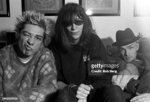 American musician, singer, composer, and lead vocalist Joey Ramone poses for a portrait with American musician, singer, songwriter and record...