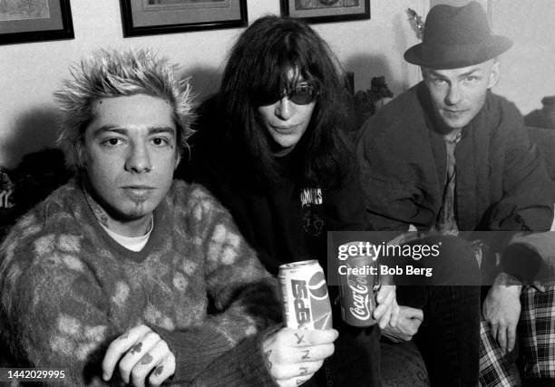 American musician, singer, composer, and lead vocalist Joey Ramone poses for a portrait with American musician, singer, songwriter and record...