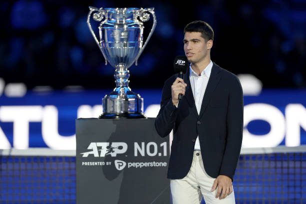 Carlos Alcaraz of Spain addresses the audience after being presented with the ATP Year End Number One Trophy during day four of the Nitto ATP Finals...