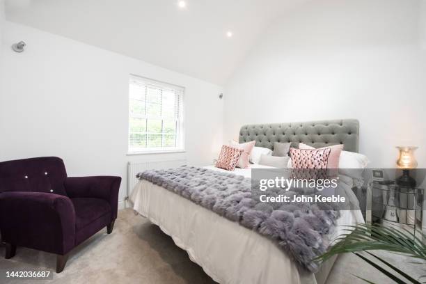 property interiors - white bedroom stock pictures, royalty-free photos & images