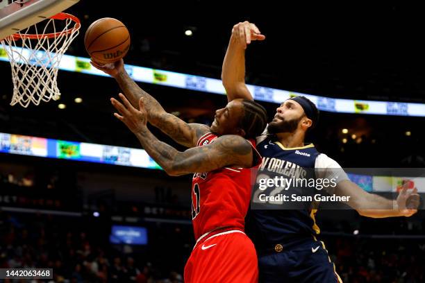 DeMar DeRozan of the Chicago Bulls is fouled by Larry Nance Jr. #22 of the New Orleans Pelicans during the second quarter at Smoothie King Center on...