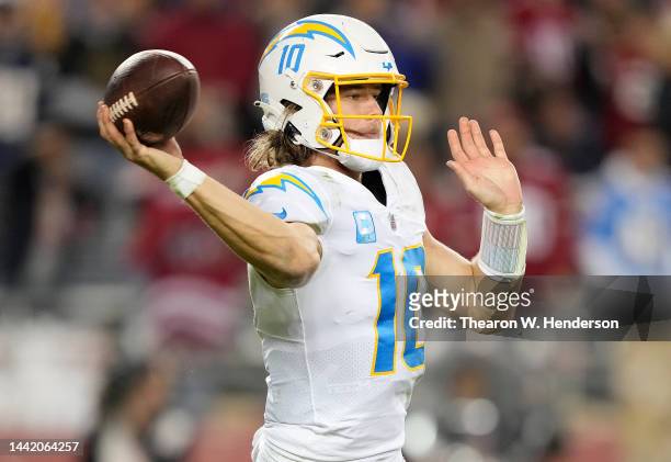 Justin Herbert of the Los Angeles Chargers throws a pass against the San Francisco 49ers during fourth quarter of an NFL football game at Levi's...