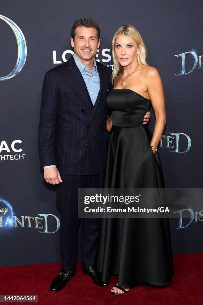Patrick Dempsey and Jillian Fink attend Disney's "Disenchanted" Premiere at El Capitan Theatre on November 16, 2022 in Los Angeles, California.