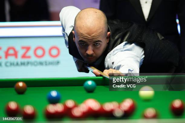 Luca Brecel of Belgium plays a shot during the second round match against Tom Ford of England on day 5 of 2022 Cazoo UK Championship at Barbican...