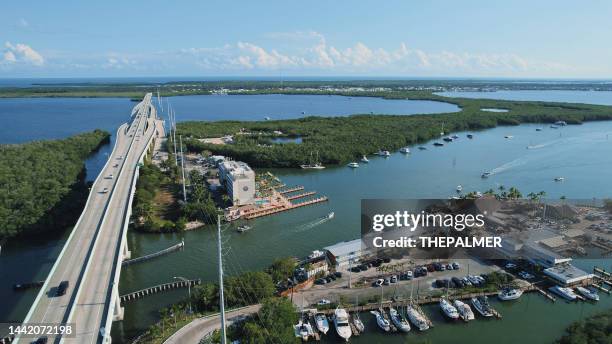 the florida keys - key largo bridge drone view at sunset - monroe county florida stock pictures, royalty-free photos & images