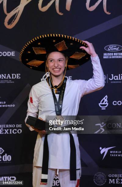 Daniela Souza of Mexico poses after winning Women's 49kg on day 3 of World Taekwondo Championships Guadalajara 2022 at Centro Acuatico Metropolitano...