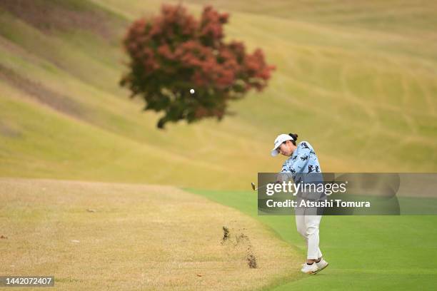 Ritsuko Ryu of Japan hits her third shot on the 11th hole during the first round of Daio Paper Elleair Ladies at Elleair Golf Club Matsuyama on...