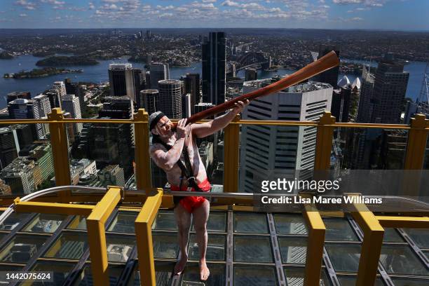 First Nations performer, Wiradjuri man Karl Wickey plays the didgeridoo welcoming members of Haka For Life at the Sydney Tower Eye on November 17,...