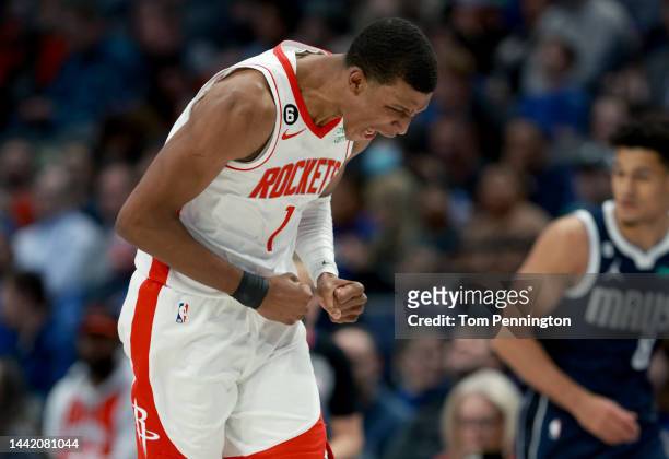 Jabari Smith Jr. #1 of the Houston Rockets reacts after scoring against the Dallas Mavericks in the fourth quarter at American Airlines Center on...