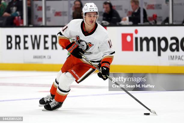 Trevor Zegras of the Anaheim Ducks controls the puck during a game at Honda Center on November 15, 2022 in Anaheim, California.