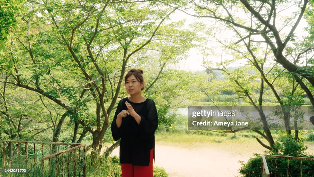 Japanese Sign Language Wave A Japanese Person Who Is Head Of Deaf Lgbtq Community Communicating In ...