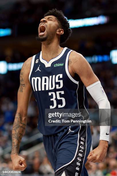 Christian Wood of the Dallas Mavericks reacts after scoring against the Houston Rockets in the fourth quarter at American Airlines Center on November...