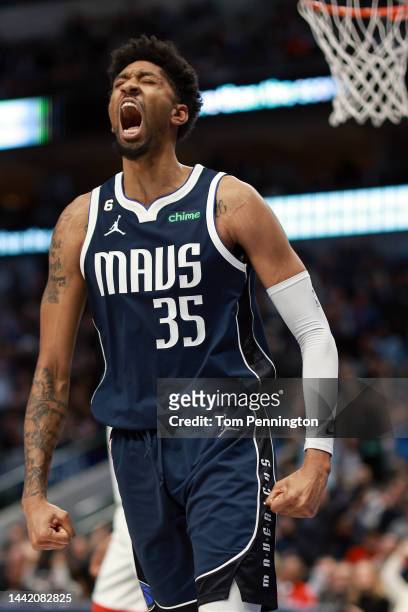 Christian Wood of the Dallas Mavericks reacts after scoring against the Houston Rockets in the fourth quarter at American Airlines Center on November...
