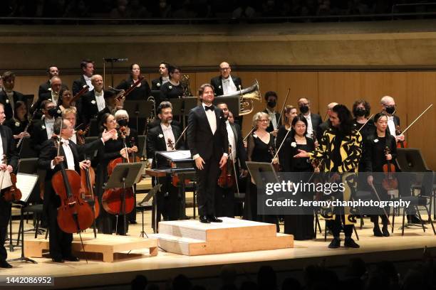 Yo-Yo Ma, Gustavo Gimeno, and Jeremy Dutcher celebrate with the Toronto Symphony Orchestra during Celebration 100: A Gala With Yo-Yo Ma at Roy...