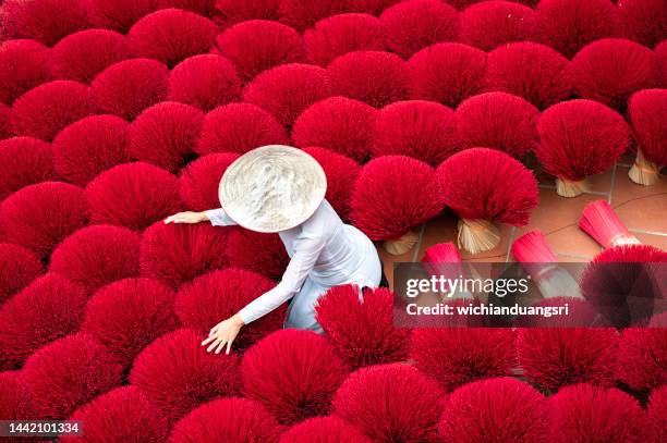 drying incense stick in vietnam - vietnam stock pictures, royalty-free photos & images