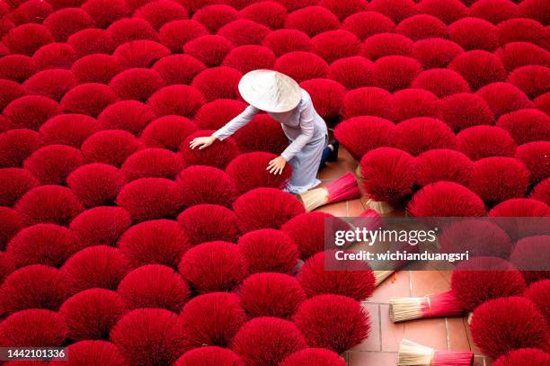 drying incense stick in vietnam - asia tradition stock pictures, royalty-free photos & images