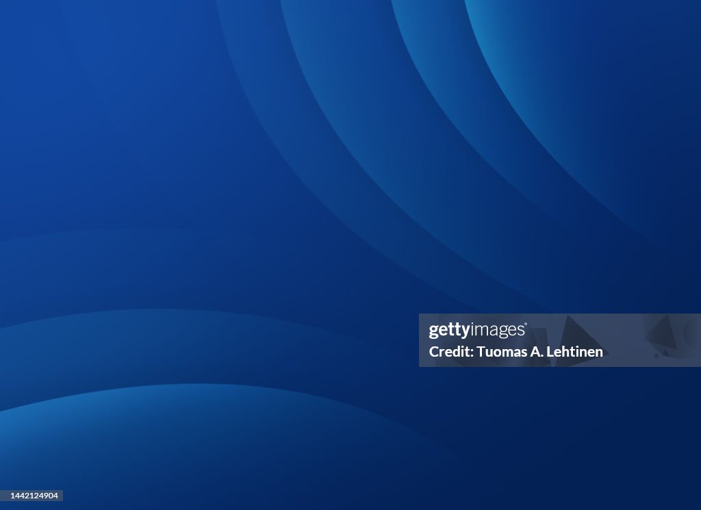 Abstract background of curved blue lines or layers on blue.