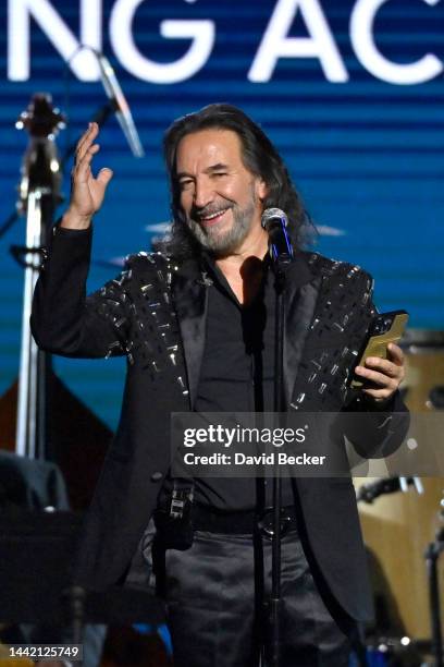 Honoree Marco Antonio Solís accepts the Person of the Year award onstage during the 2022 Latin Recording Academy Person of the Year Honoring Marco...