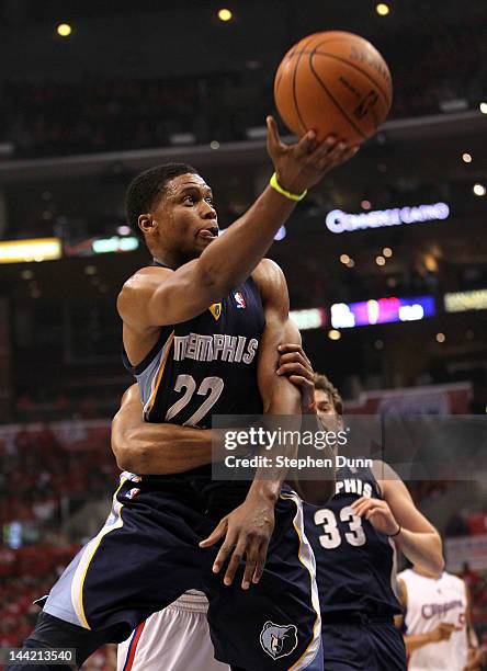Rudy Gay of the Memphis Grizzlies is fouled by Randy Foye of the Los Angeles Clippers as Gay makes the layup in the first quarter in Game Six of the...