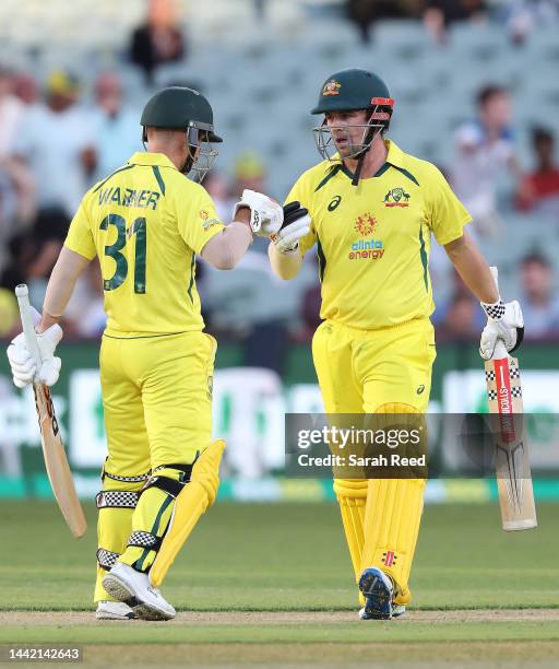 David Warner of Australia and Travis Head of Australia during game one of the One Day International series between Australia and England at Adelaide...