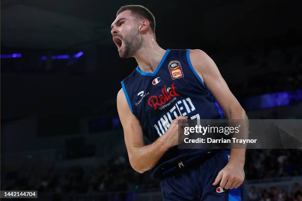 Isaac Humphries of Melbourne United reacts after dunking the ball during the round 7 NBL match between Melbourne United and Adelaide 36ers at John...