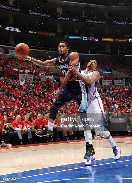 Mike Conley of the Memphis Grizzlies goes to the basket against Randy Foye of the Los Angeles Clippers in Game Six of the Western Conference...