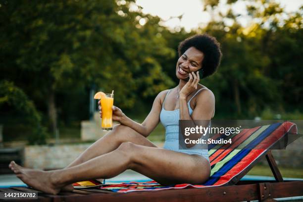 relaxing on the patio - dominican ethnicity bildbanksfoton och bilder