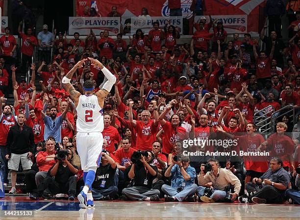 Kenyon Martin of the Los Angeles Clippers pumps up the fans during the game against the Memphis Grizzlies in Game Six of the Western Conference...