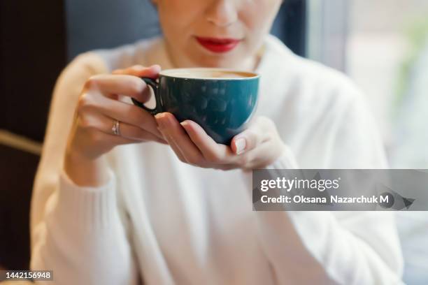 woman with red lips drinking coffee - inside human mouth stock pictures, royalty-free photos & images