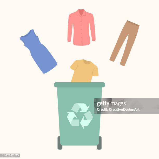 recycle, sustainable fashion and environmental protection concept. dress, t-shirt, pants and shirt throwing into container - recycling bins stock illustrations