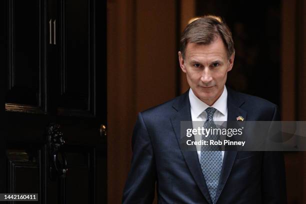 Chancellor of the Exchequer Jeremy Hunt departs Downing Street to present the Autumn Statement to the House of Commons on November 17, 2022 in...