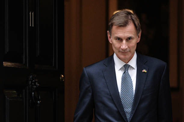 Chancellor of the Exchequer Jeremy Hunt departs Downing Street to present the Autumn Statement to the House of Commons on November 17, 2022 in...