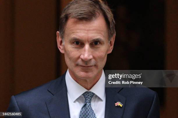 Chancellor of the Exchequer Jeremy Hunt departs Downing Street to present the Autumn Statement to the House of Commons on November 17, 2022 in...