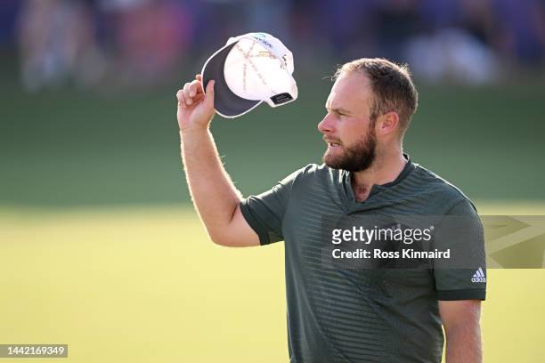 Tyrrel Hatton of England Acknowledges the crowd after finishing his round on the 18th hole during Day One of the DP World Tour Championship on the...