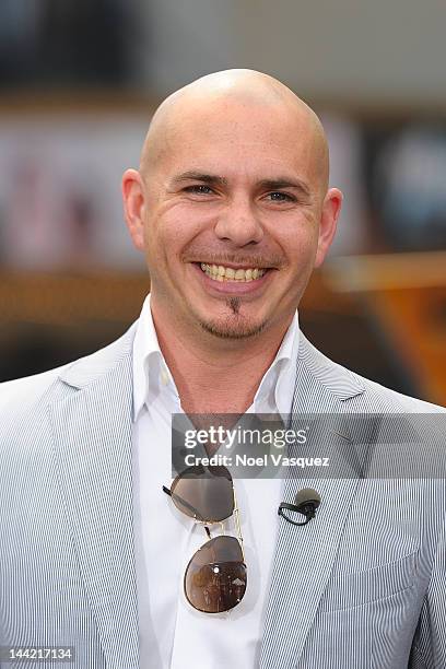 Pitbull visits "Extra" at The Grove on May 11, 2012 in Los Angeles, California.