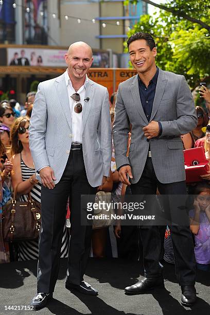 Pitbull and Mario Lopez visit "Extra" at The Grove on May 11, 2012 in Los Angeles, California.