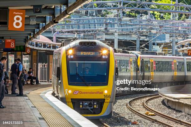 queensland rail electric train arriving at brisbane's roma street station - ipswich australia stock pictures, royalty-free photos & images