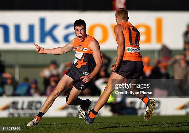Jeremy Cameron of the Giants celebrates after kicking a goal during the round seven AFL match between the Greater Western Sydney Giants and the Gold...