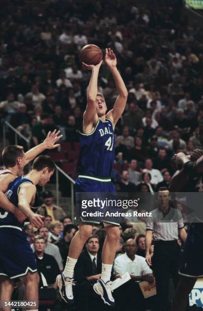 German basketball player Dirk Nowitzki of the Dallas Mavericks during the NBA match between the Seattle SuperSonics and the Mavericks, at the...