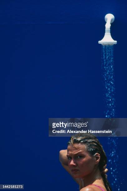 German swimmer Franziska van Almsick under a shower at the 1995 FINA World Swimming Championships, held on Copacabana Beach in Rio de Janeiro,...