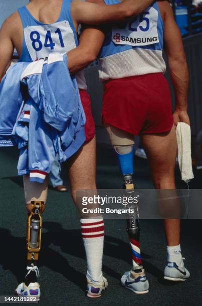 Two Paralympians at the 1988 Summer Paralympics in Seoul, South Korea, October 1988. The 1988 Games were the first games to officially use the term...