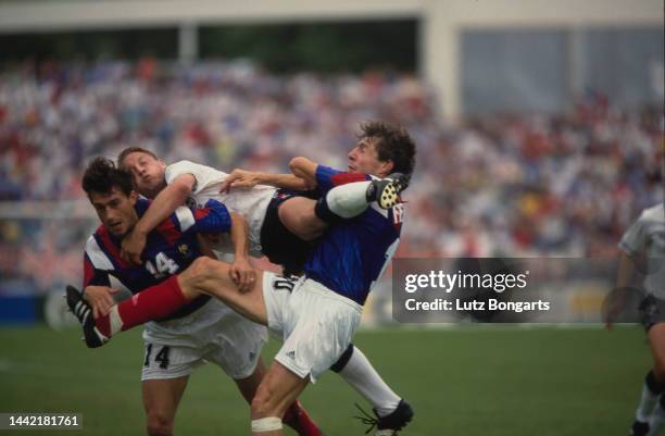 French footballer Jean-Philippe Durand, British footballer David Batty, and Spanish-born French footballer Luis Fernandez in action during the Group...