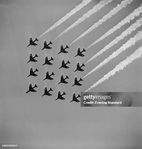 Squadron's aerobatics team 'The Blue Diamonds' flying Royal Air Force Hawker Hunter aircraft in a diamond formation at Farnborough International...