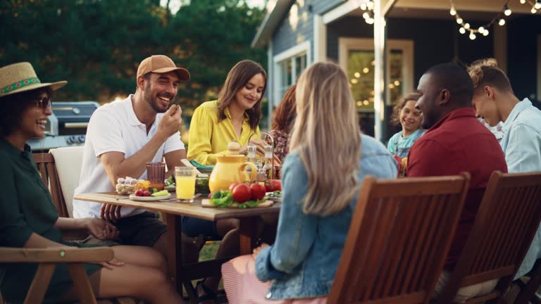 https://media.gettyimages.com/id/1442184251/video/family-and-multiethnic-diverse-friends-gathering-together-at-a-garden-table-people-eating.jpg?b=1&s=640x640&k=20&c=Nu4m9x4j_mCLKUY5v3M6RSyy1xCXBnLuNACZkrj5IW8=
