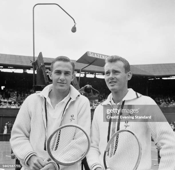 Australian tennis players John Newcombe and Ken Fletcher before a men's doubles match at the Wimbledon Tennis Championships in London in July 1961.