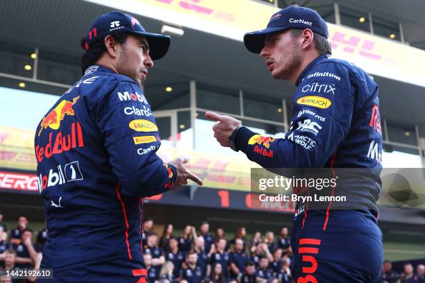 Max Verstappen of the Netherlands and Oracle Red Bull Racing and Sergio Perez of Mexico and Oracle Red Bull Racing talk ahead of the Red Bull Racing...