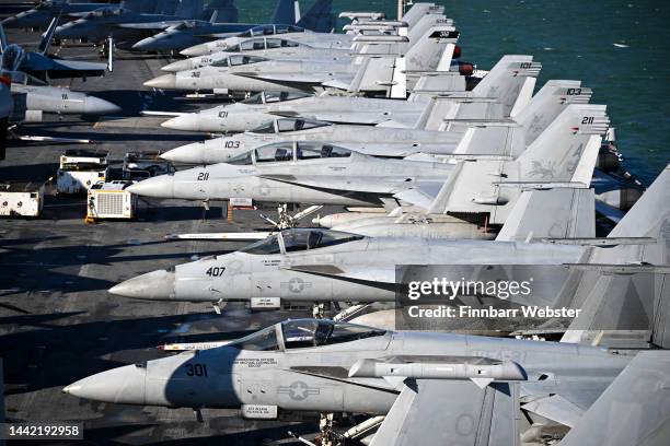 Jet fighters are seen on the flight deck of USS Gerald R. Ford, on November 17, 2022 in Gosport, England. The USS Gerald R. Ford is the lead ship of...